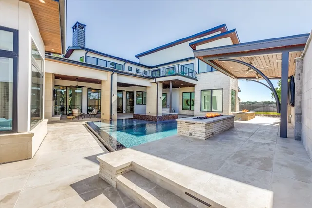 an aerial view of a house with a garden