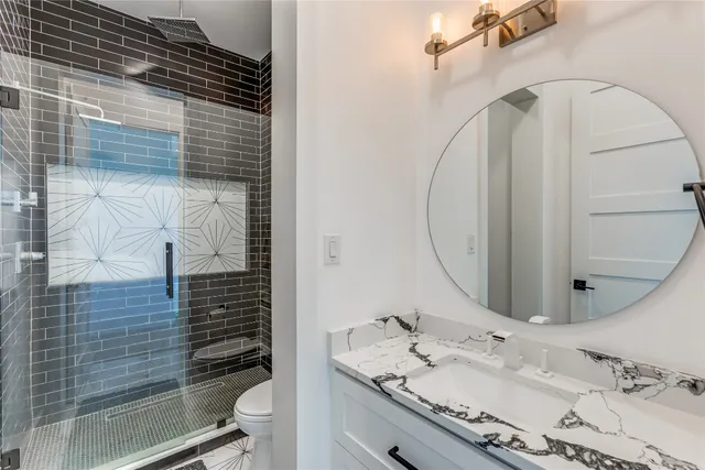 a view of a room with furniture and window