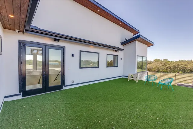 a kitchen with a sink and a stove top oven