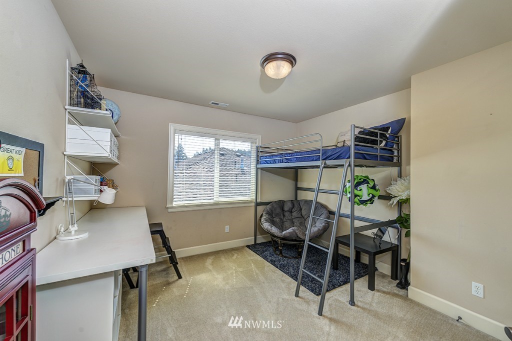 5370 Northeast 17th Street Renton, WA 98059 - Photo 18 of 25 a room with furniture and a window