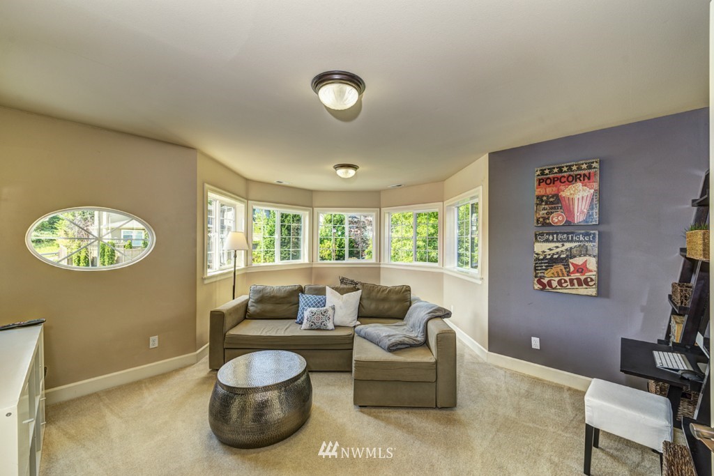5370 Northeast 17th Street Renton, WA 98059 - Photo 20 of 25 a living room with furniture and a large window