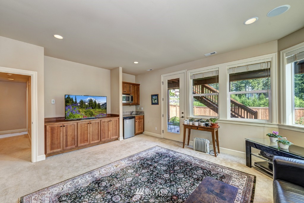 5370 Northeast 17th Street Renton, WA 98059 - Photo 21 of 25 a living room with furniture a window and a table