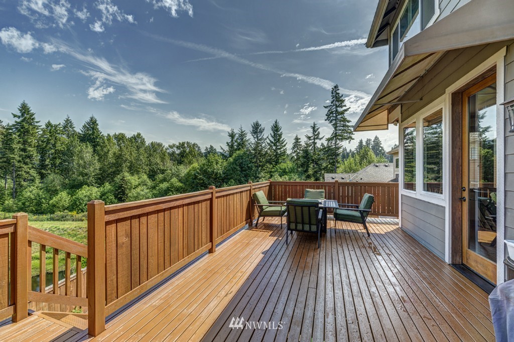 5370 Northeast 17th Street Renton, WA 98059 - Photo 23 of 25 a view of balcony with furniture and wooden floor