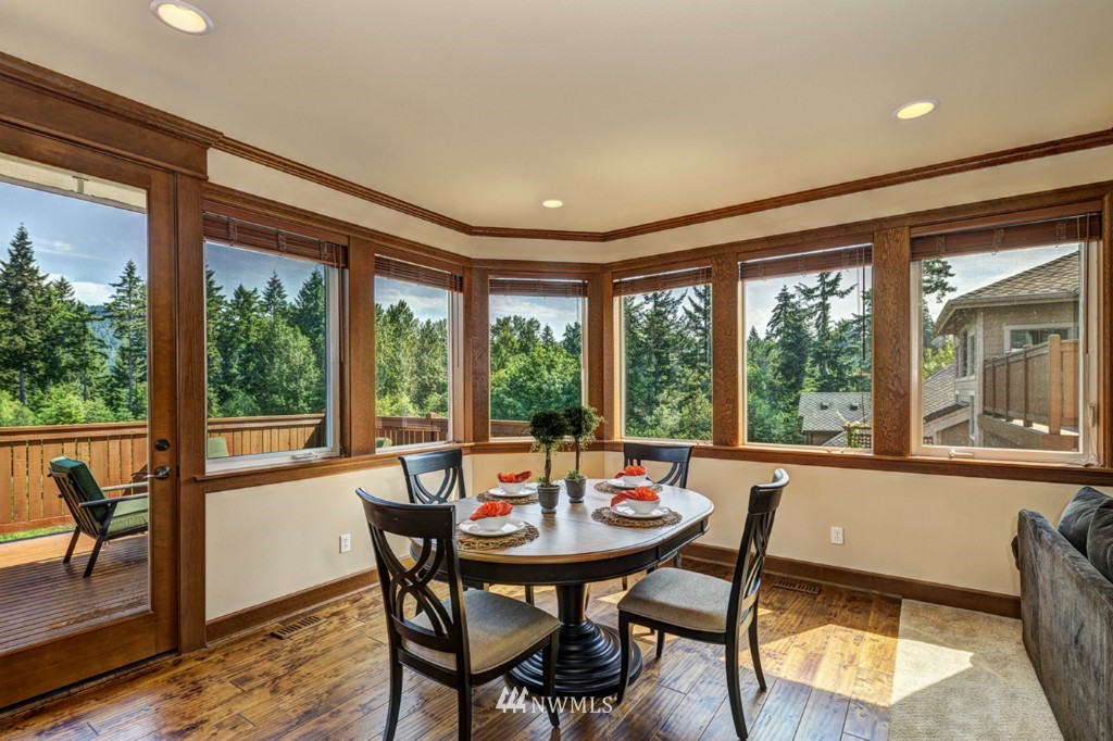 5370 Northeast 17th Street Renton, WA 98059 - Photo 7 of 25 a view of a dining room with furniture window and outside view