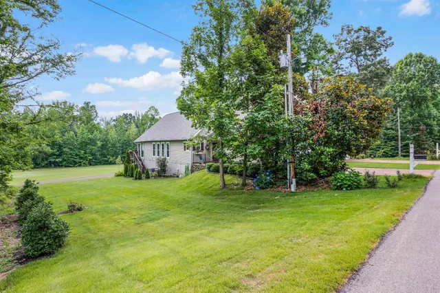 a view of a house with a big yard