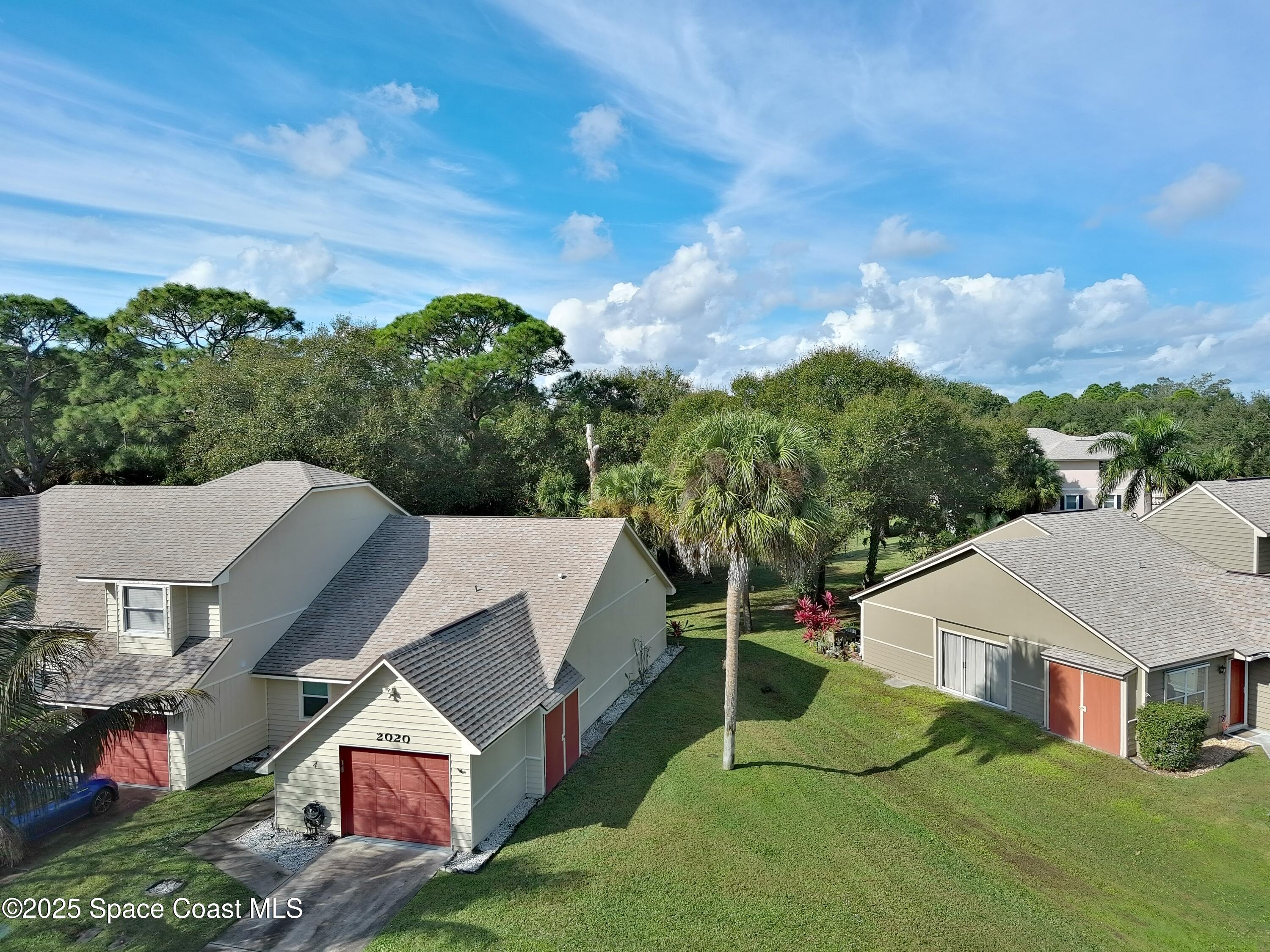 2020 Vero S Circle Southwest, Unit 4 Vero Beach, FL 32962 - Photo 18 of 33 an aerial view of a house