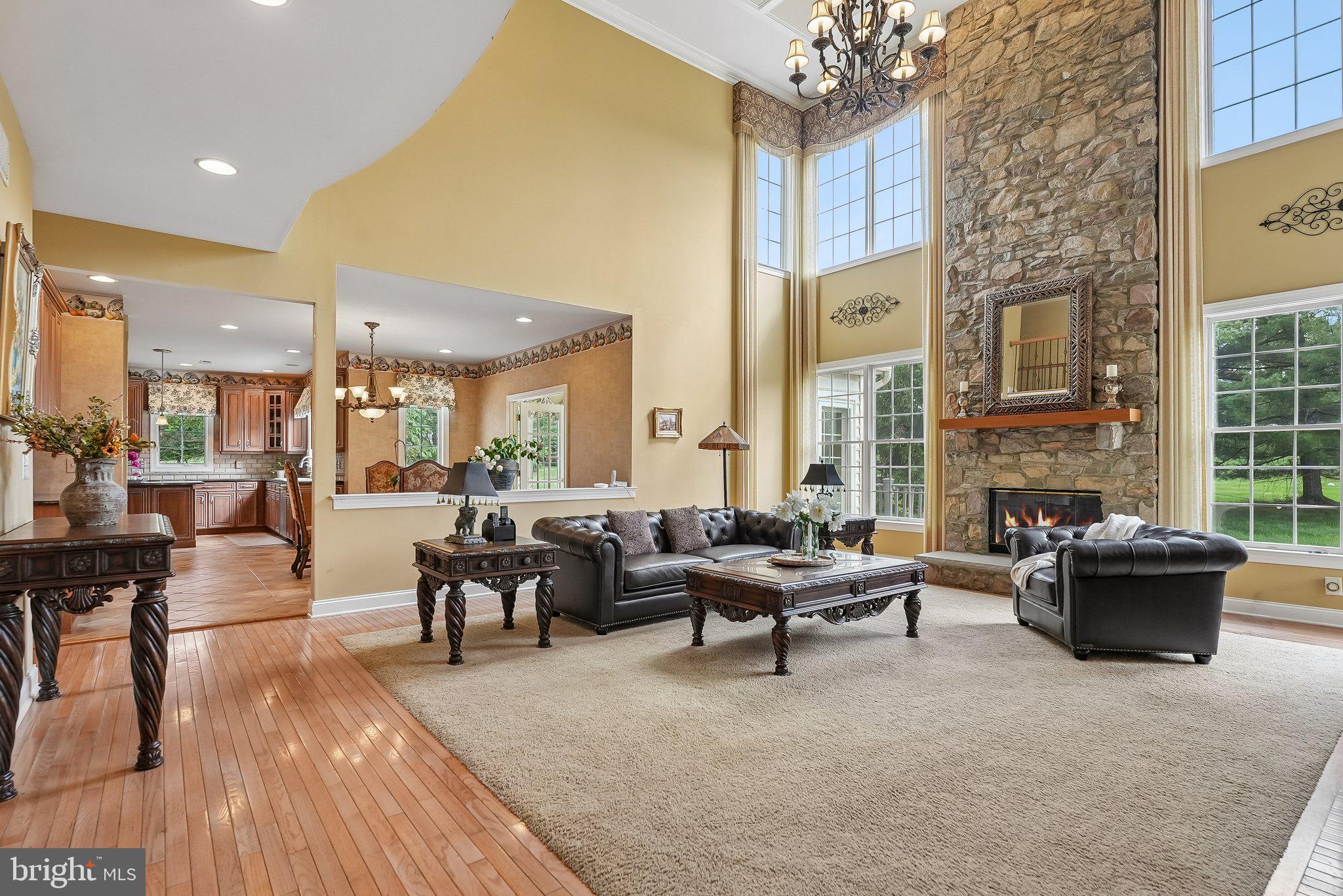1 Baker Way Pennington, NJ 08534 - Photo 8 of 77 a living room with fireplace furniture and a fireplace