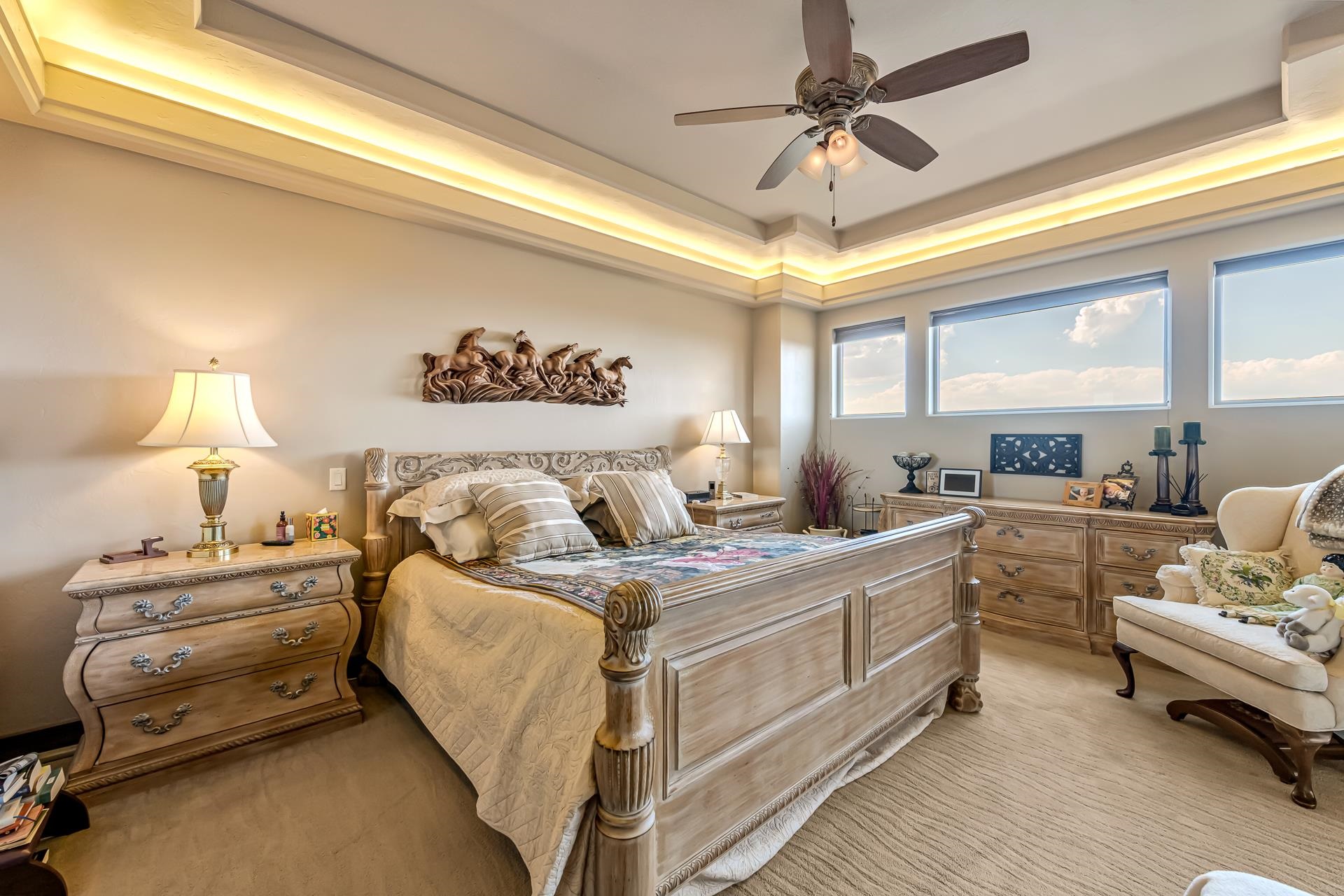355 West Ridges Boulevard Grand Junction, CO 81507 - Photo 12 of 42 a bed room with a bed and a chandelier