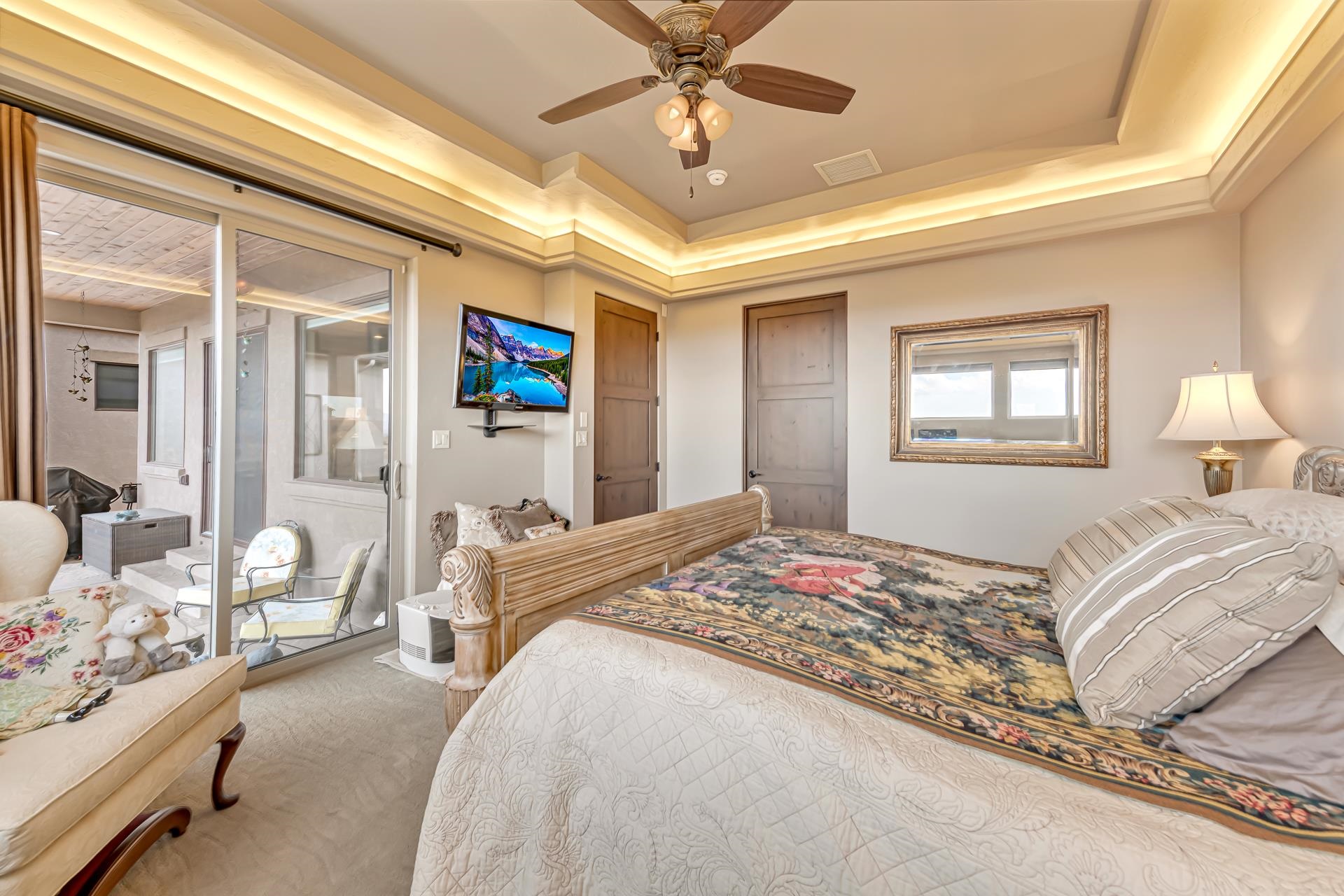 355 West Ridges Boulevard Grand Junction, CO 81507 - Photo 14 of 42 a bedroom with a bed and ceiling fan
