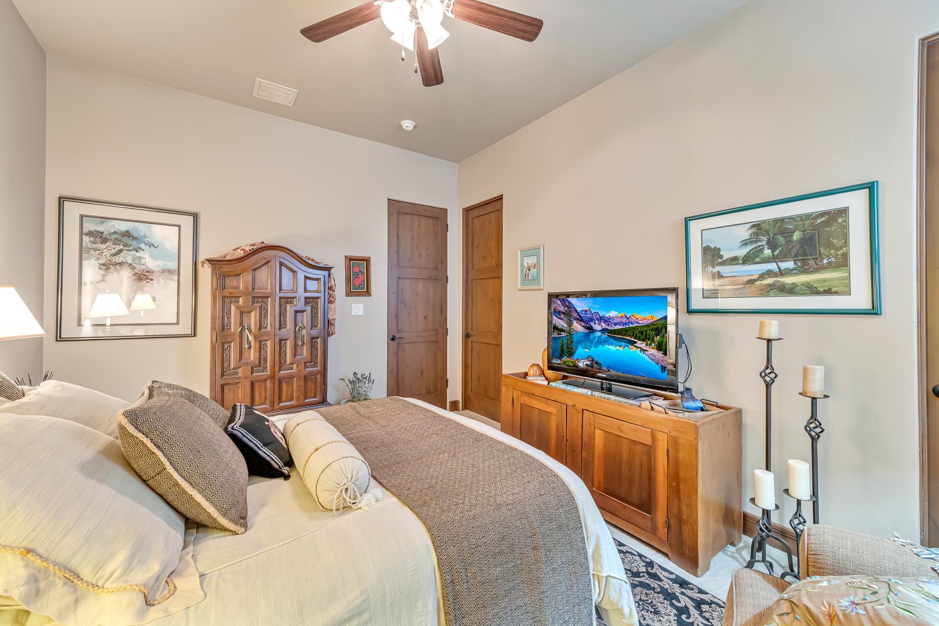 355 West Ridges Boulevard Grand Junction, CO 81507 - Photo 19 of 42 a bedroom with a bed furniture and a flat screen tv