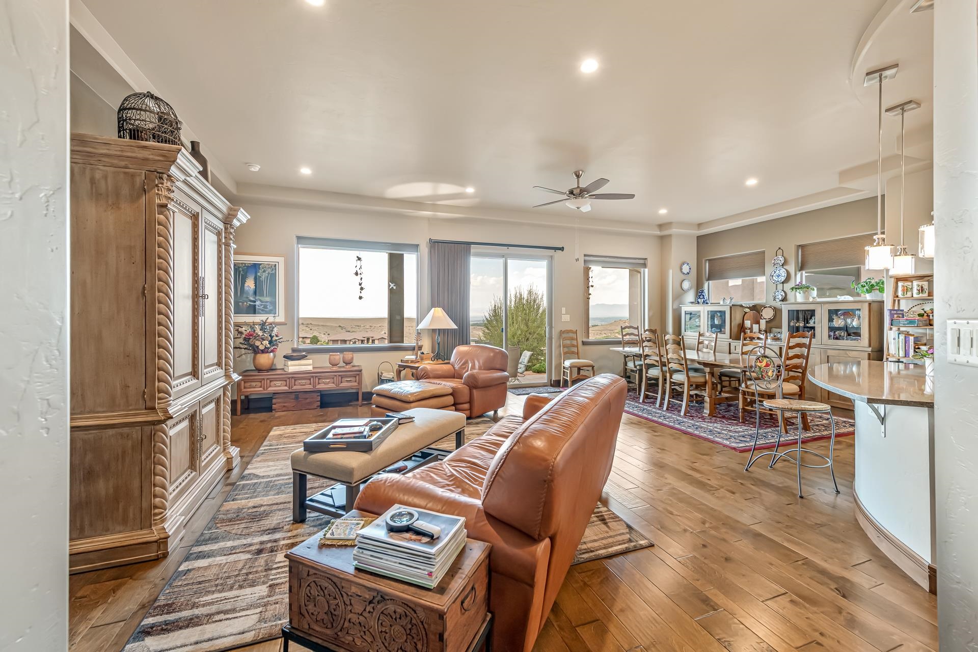 355 West Ridges Boulevard Grand Junction, CO 81507 - Photo 2 of 42 a very nice looking living room with a dining table and a refrigerator