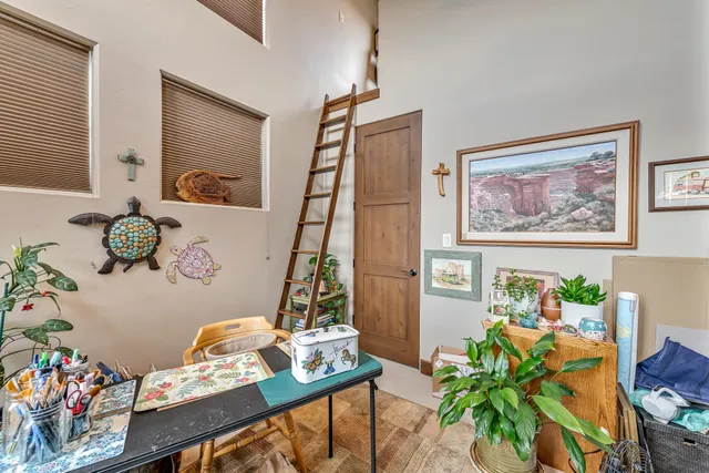 a living room with furniture and decor