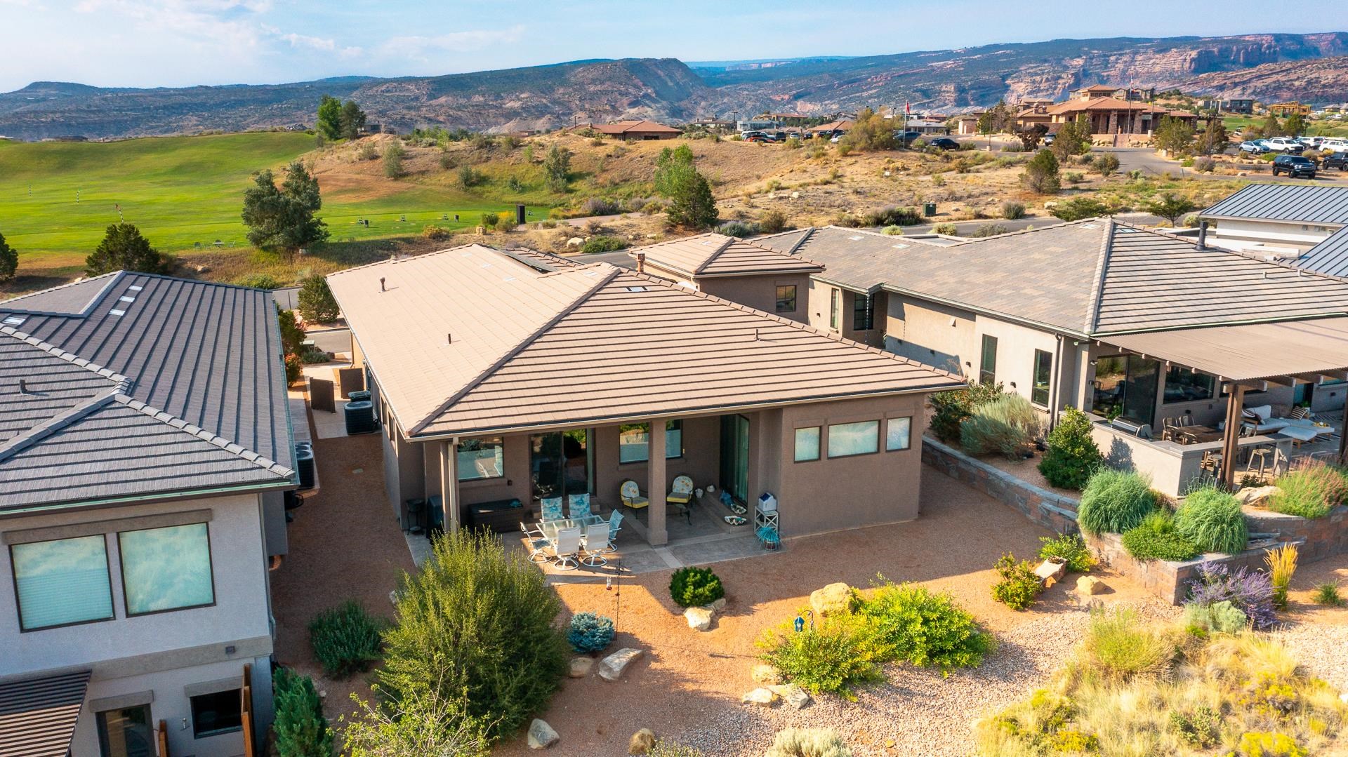 355 West Ridges Boulevard Grand Junction, CO 81507 - Photo 29 of 42 an aerial view of a house with a garden and lake view