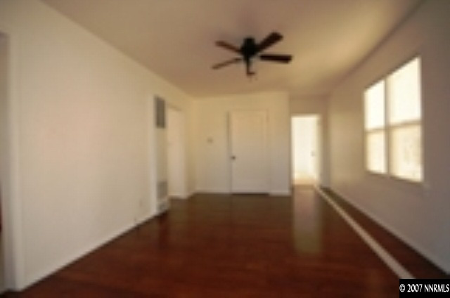 1349 Locust Street Reno, NV 89502 - Photo 3 of 9 a view of an empty room and a window