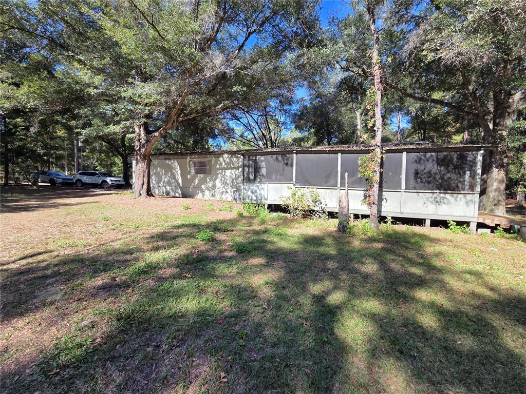 114 Lemon Street Melrose, FL 32666 - Photo 16 of 17 a view of swimming pool with a sitting area