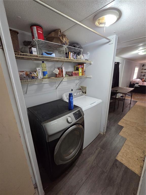 114 Lemon Street Melrose, FL 32666 - Photo 5 of 17 a utility room with sink dryer and washer