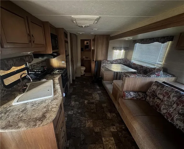 a room with gym equipment and a large window