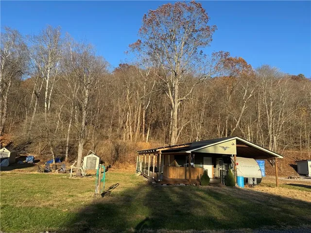 a house with river in front of it