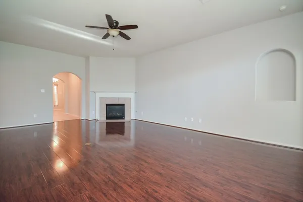 a view of an empty room with a window