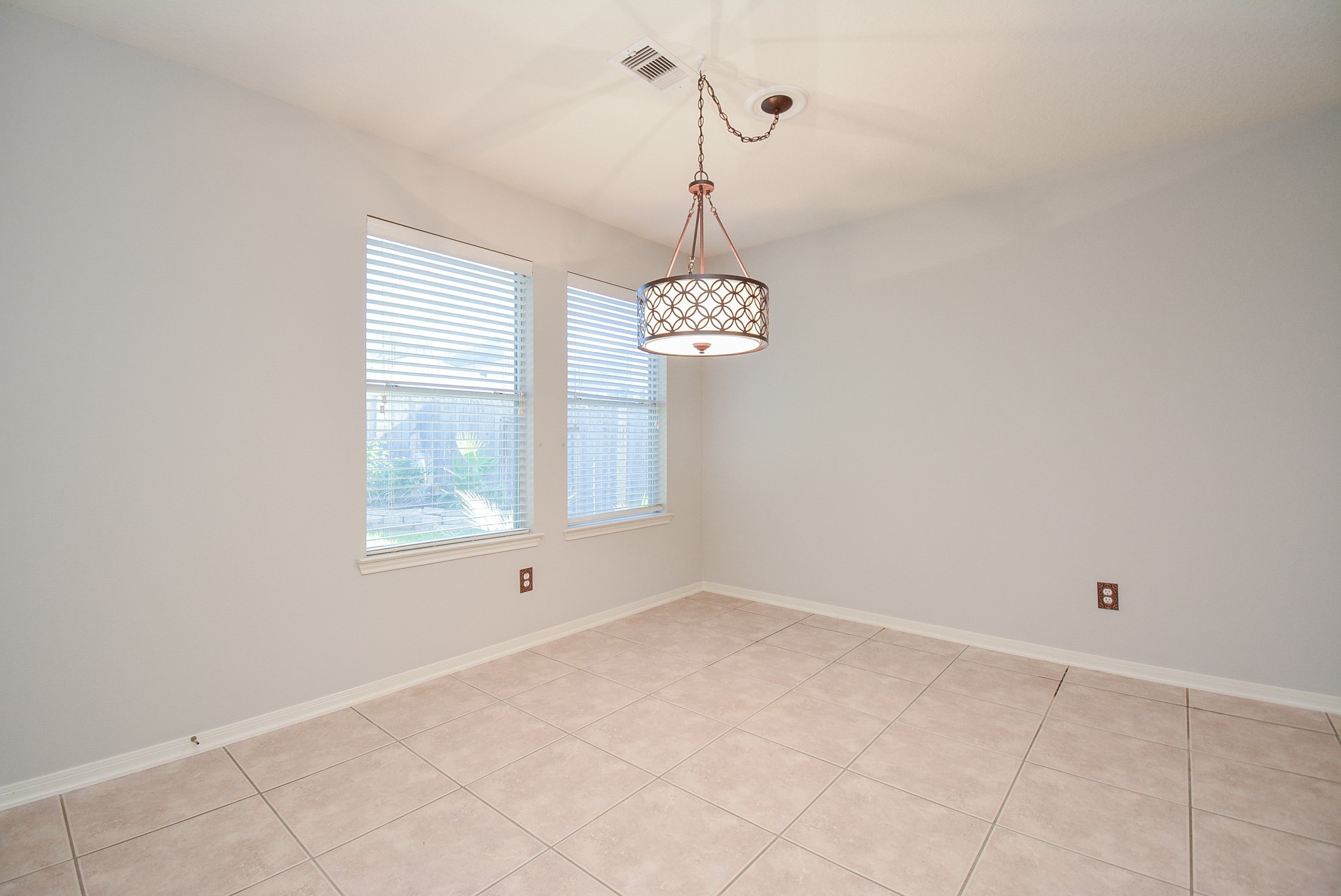 18714 Flagstone Creek Road Houston, TX 77084 - Photo 25 of 50 a view of an empty room with a window