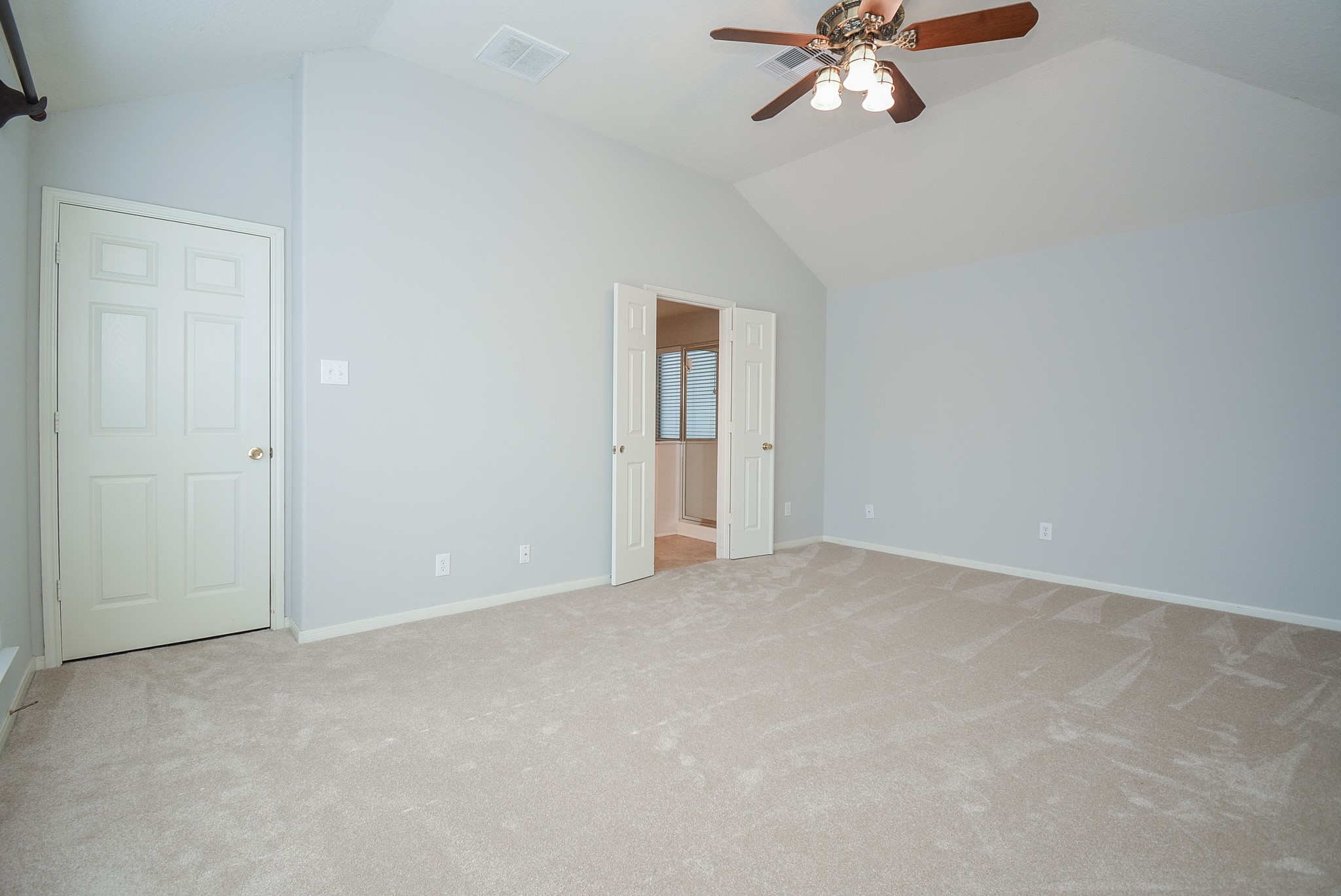 18714 Flagstone Creek Road Houston, TX 77084 - Photo 37 of 50 a view of an empty room with a window