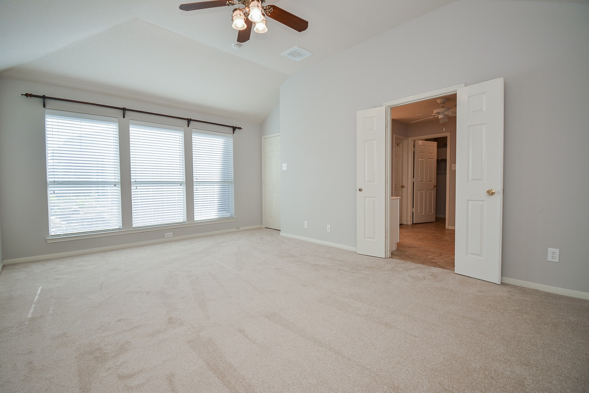 18714 Flagstone Creek Road Houston, TX 77084 - Photo 38 of 50 a view of an empty room with a window