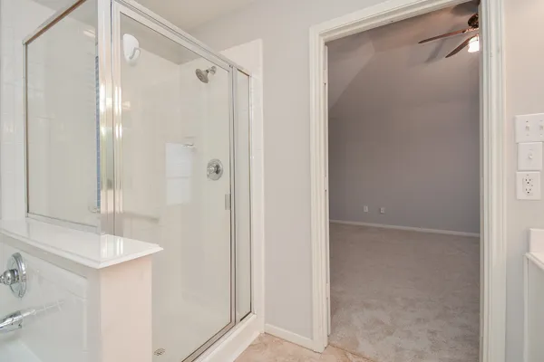 a bathroom with a sink vanity and a mirror