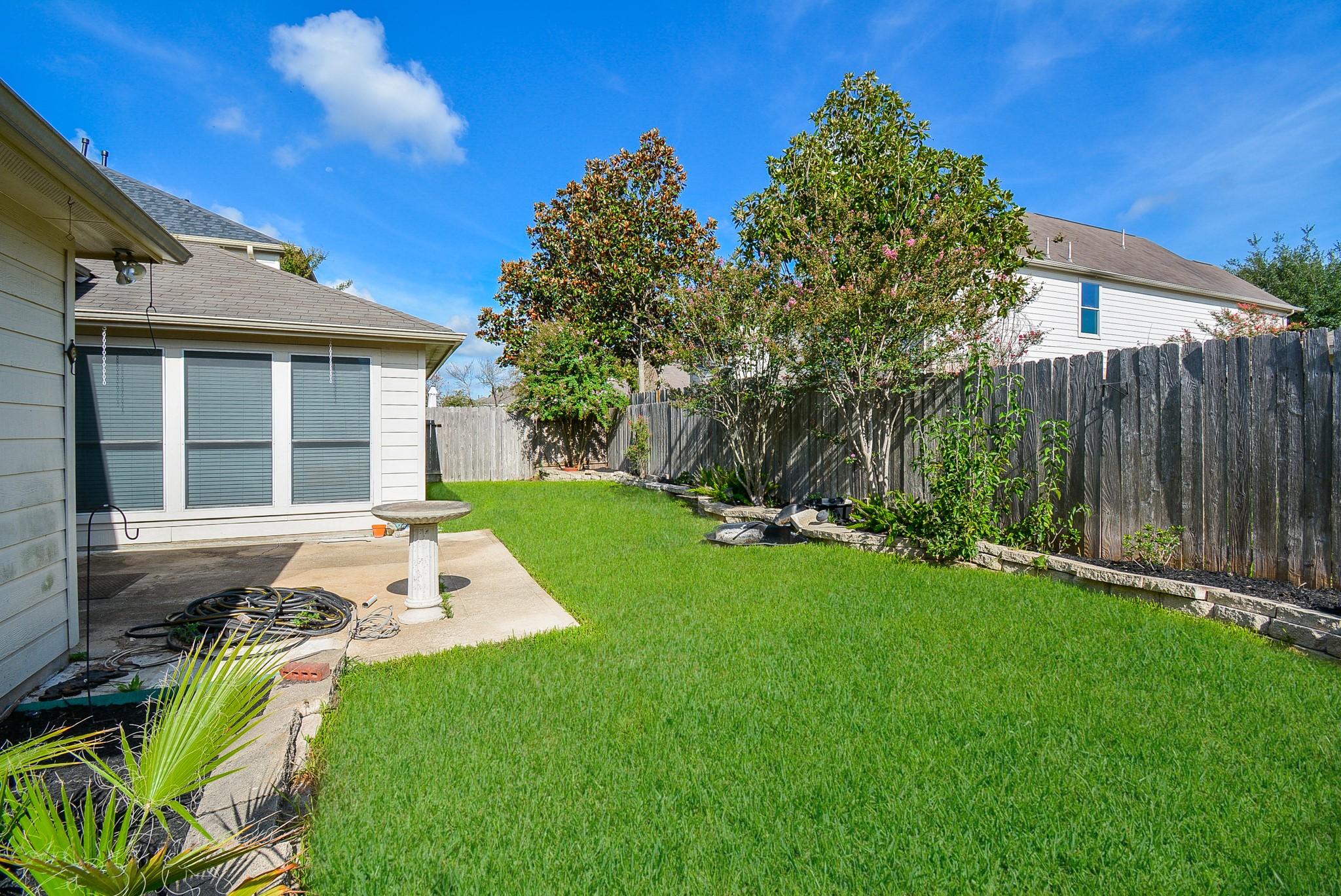 18714 Flagstone Creek Road Houston, TX 77084 - Photo 50 of 50 a view of backyard of house with green space