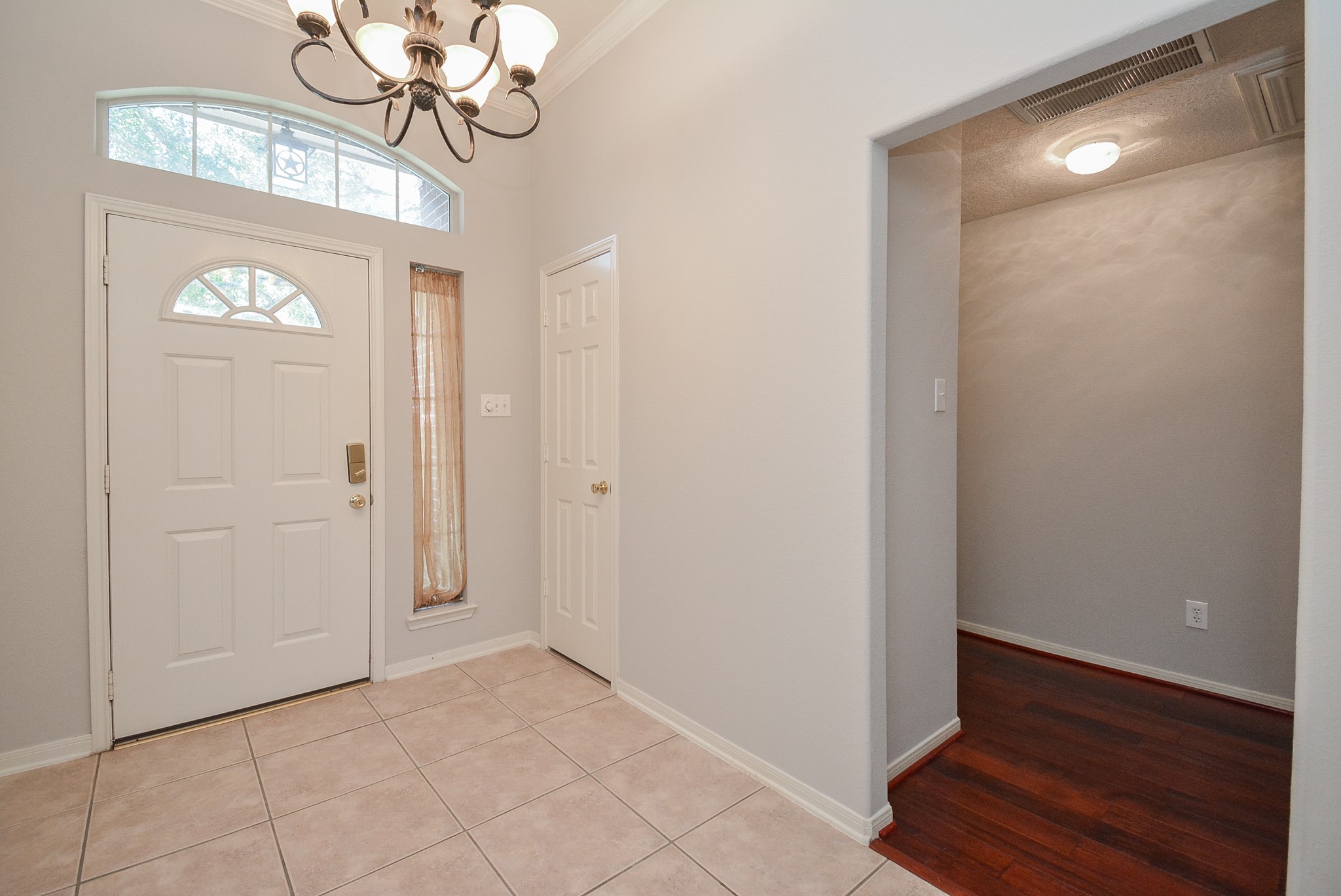 18714 Flagstone Creek Road Houston, TX 77084 - Photo 5 of 50 a view of a hallway with wooden floor