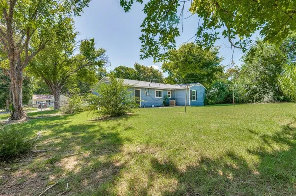 a house view with a outdoor space