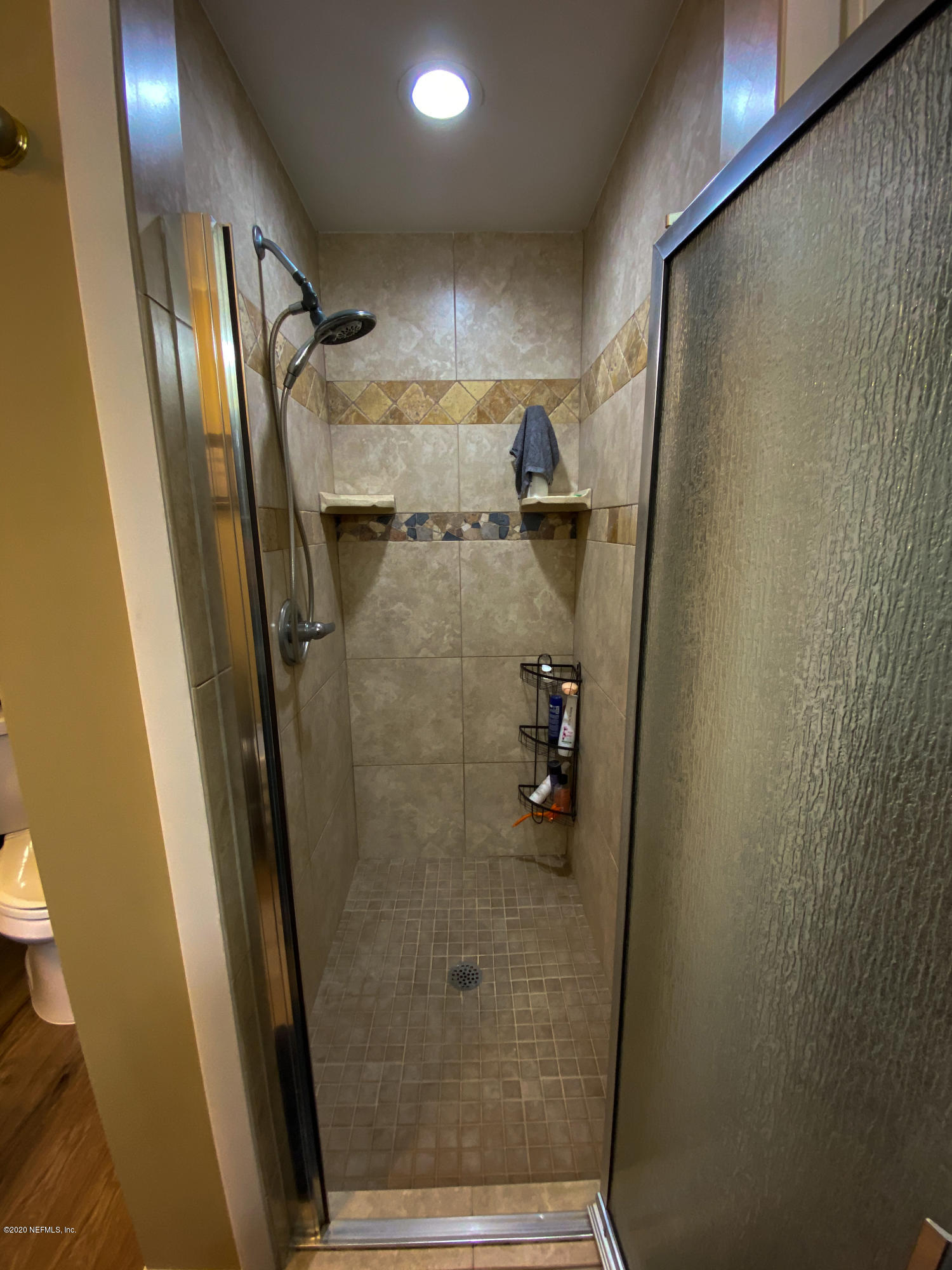86116 Pages Dairy Road Yulee, FL 32097 - Photo 32 of 46 a bathroom with a glass door shower