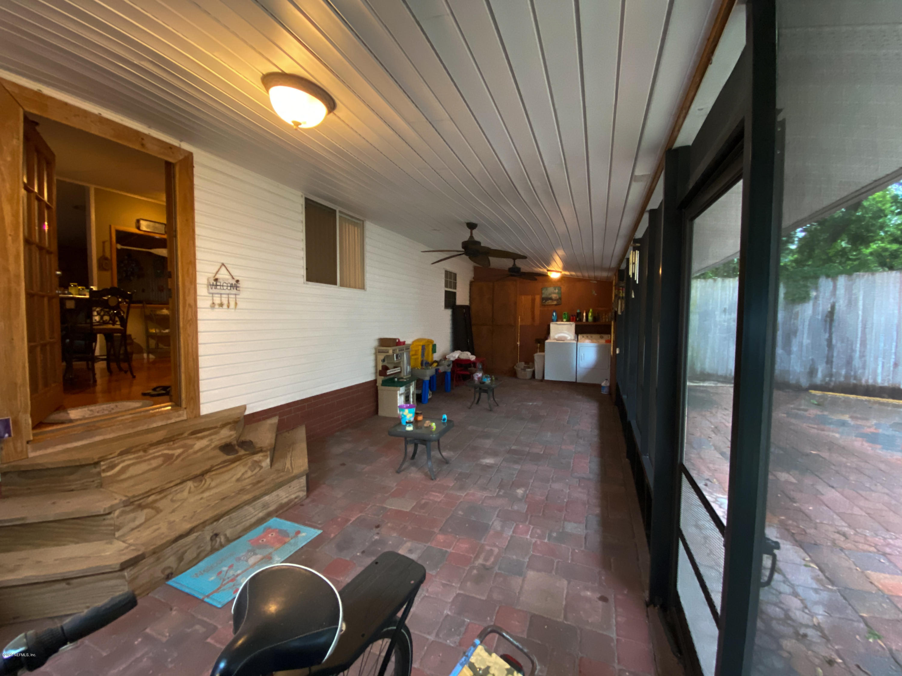 86116 Pages Dairy Road Yulee, FL 32097 - Photo 35 of 46 a view of a chairs in a patio