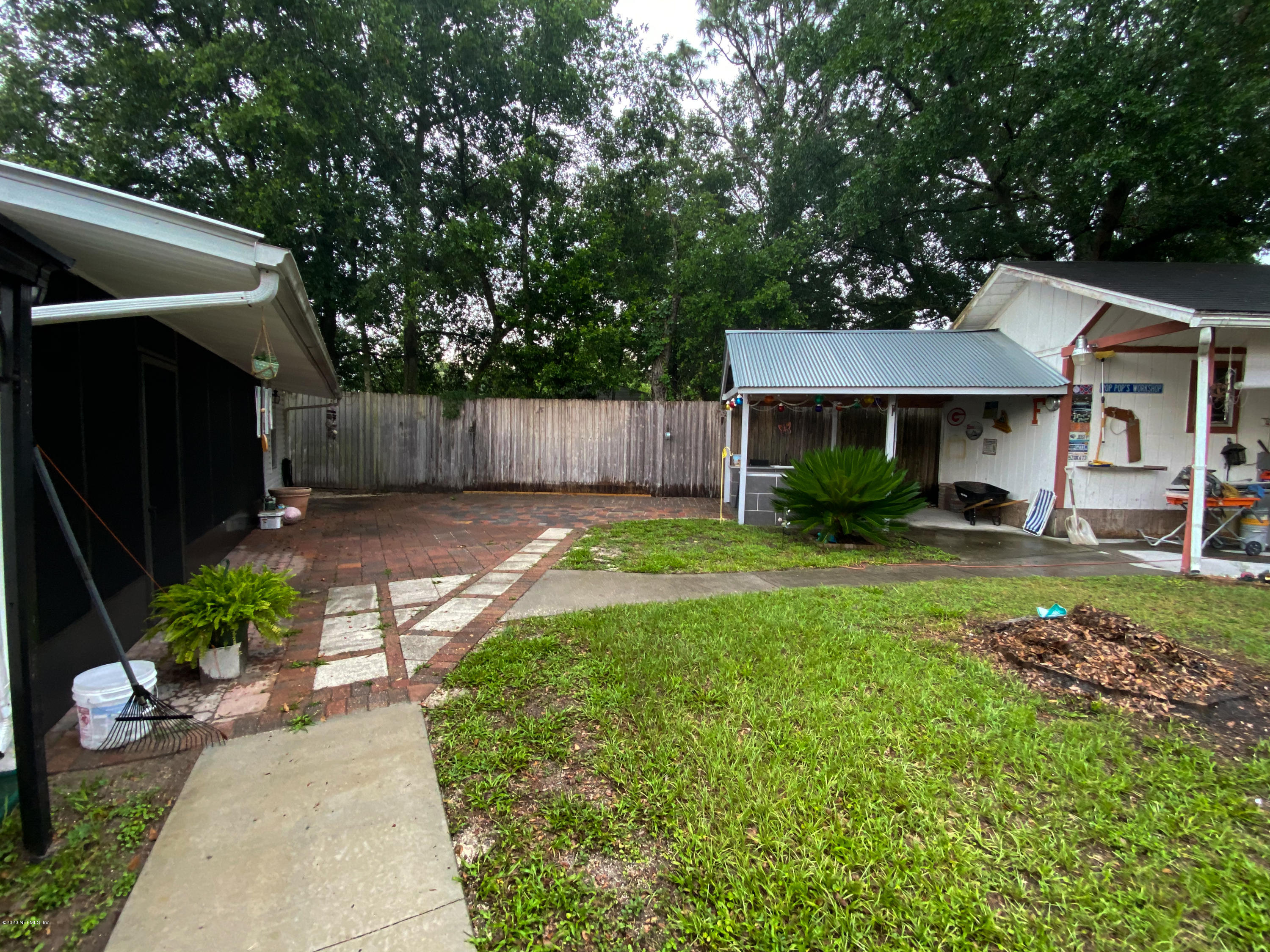 86116 Pages Dairy Road Yulee, FL 32097 - Photo 42 of 46 a view of a yard in front of house