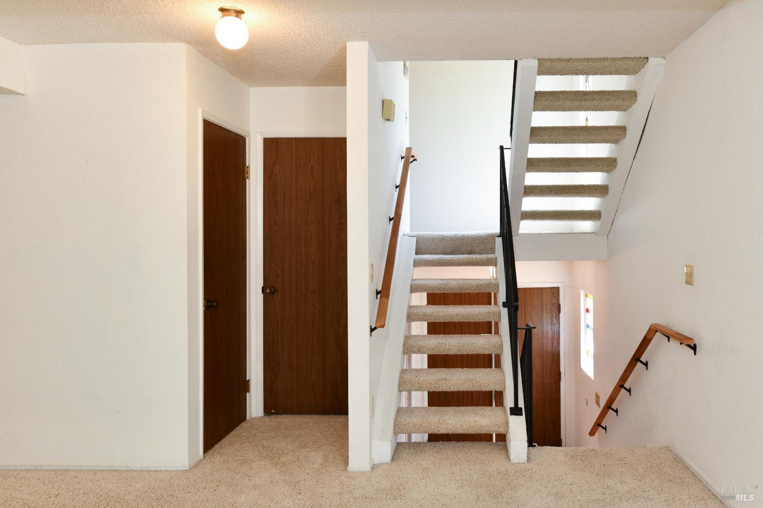 3007 Loma Court Santa Rosa, CA 95405 - Photo 43 of 43 Split level floorplan - garage and street at ground level. Stairs lead to living, dining and kitchen. Upper stairs lead to bedrooms.