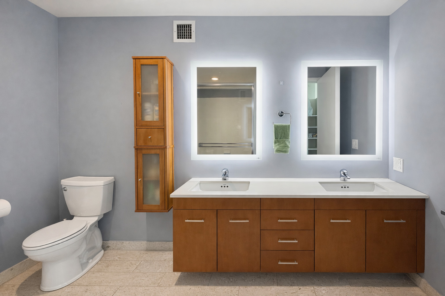 701 South Wells Street, Unit 1506 Chicago, IL 60607 - Photo 12 of 21 a bathroom with a toilet a double vanity sink and mirror
