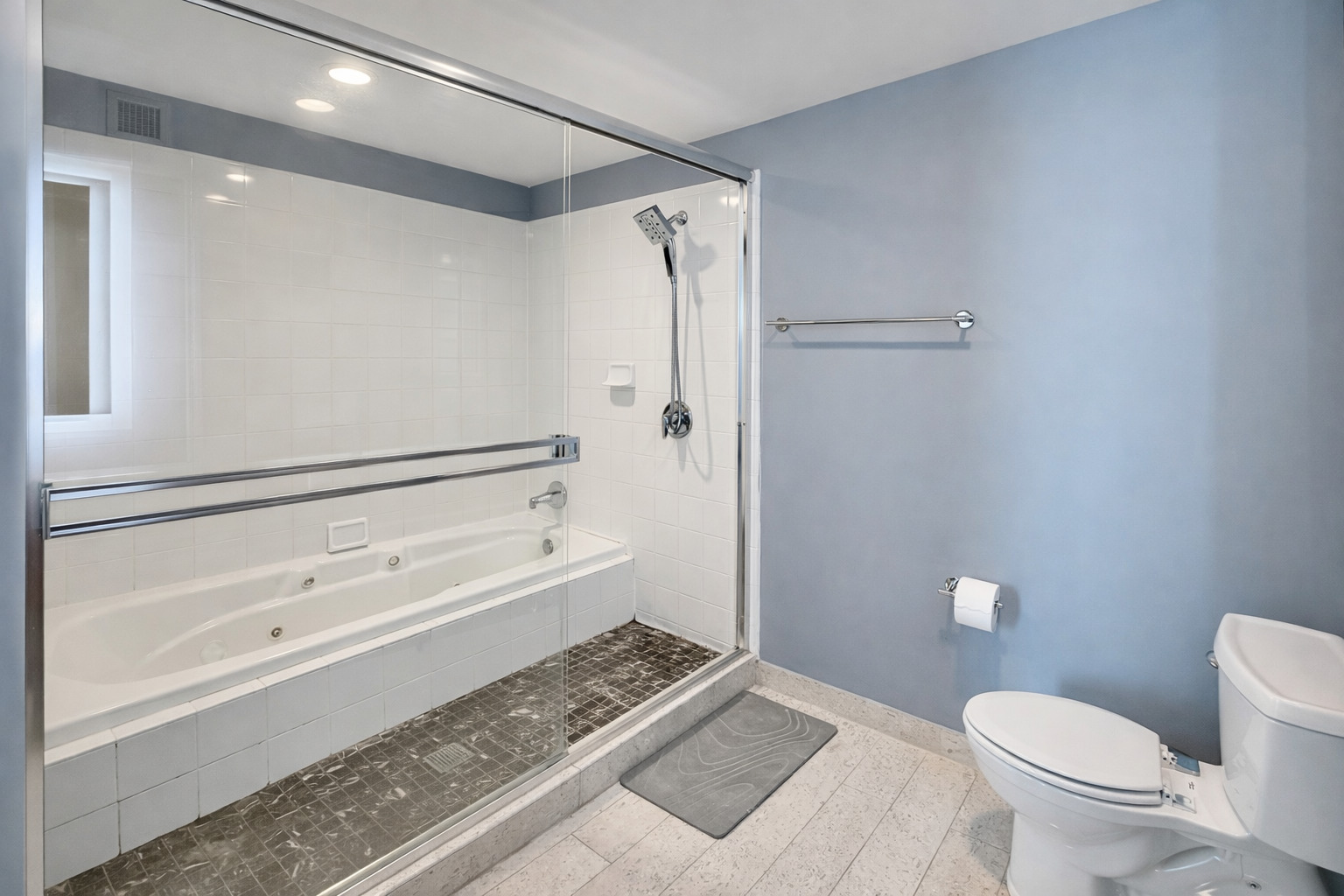 701 South Wells Street, Unit 1506 Chicago, IL 60607 - Photo 13 of 21 a bathroom with a toilet and a shower