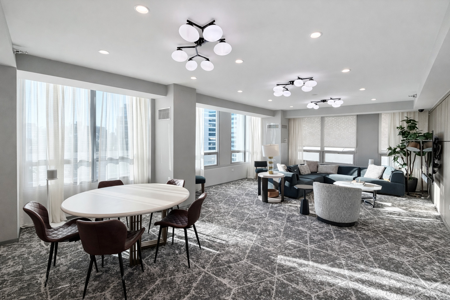 701 South Wells Street, Unit 1506 Chicago, IL 60607 - Photo 15 of 21 a view of a dining room and livingroom furniture and chandelier