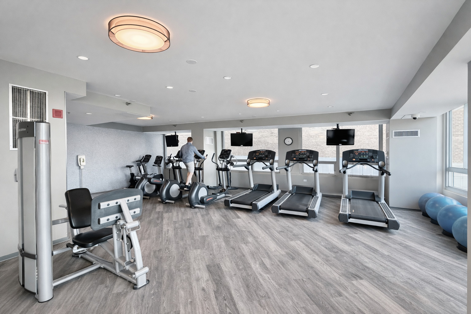 701 South Wells Street, Unit 1506 Chicago, IL 60607 - Photo 17 of 21 a view of a room with gym equipment