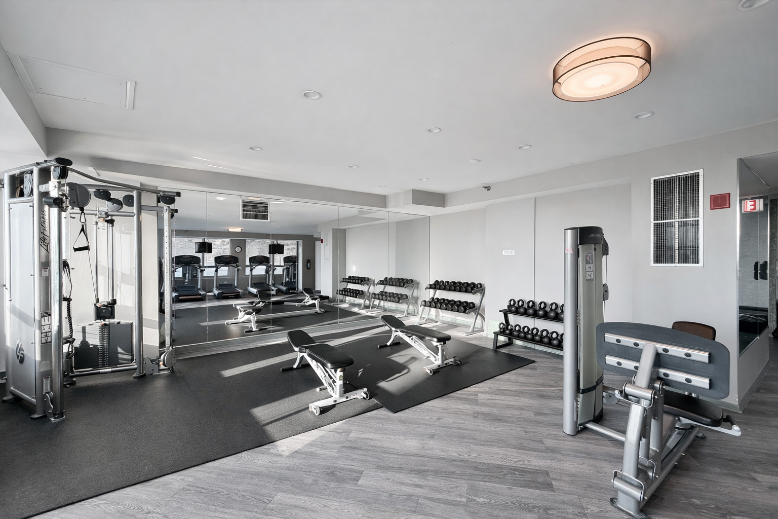 701 South Wells Street, Unit 1506 Chicago, IL 60607 - Photo 19 of 21 a view of a room with gym equipment