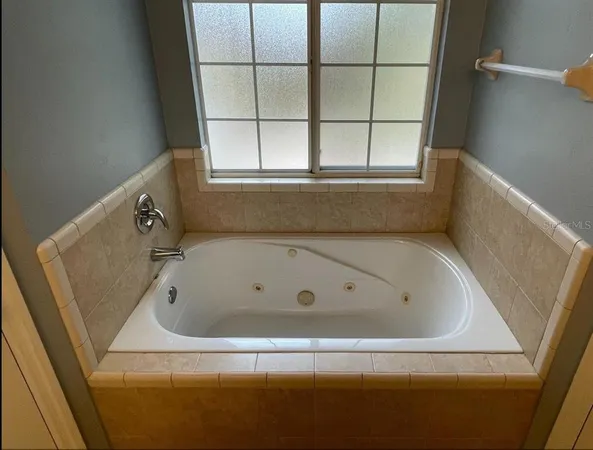 a bathroom with a bathtub