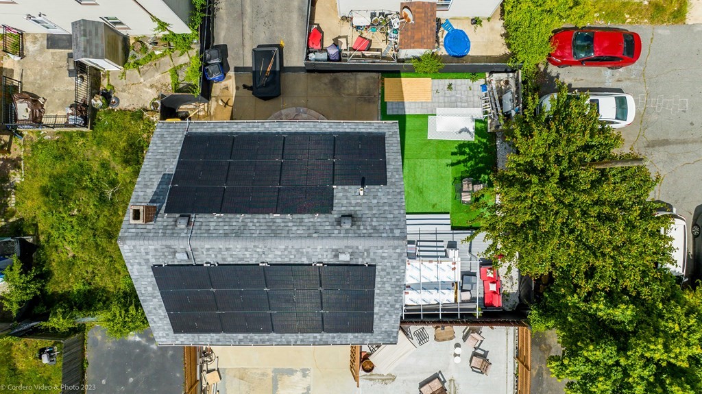 478 Third Street Fall River, MA 02721 - Photo 1 of 35 a front view of a house with a garden