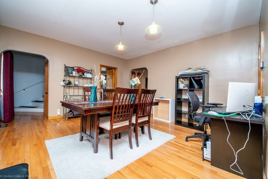 478 Third Street Fall River, MA 02721 - Photo 16 of 35 a view of a dining room with furniture and wooden floor
