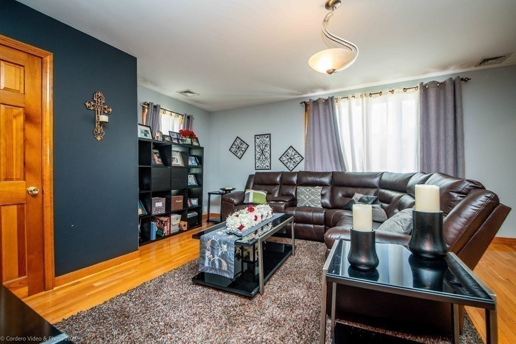 478 Third Street Fall River, MA 02721 - Photo 22 of 35 a living room with furniture a rug and a window