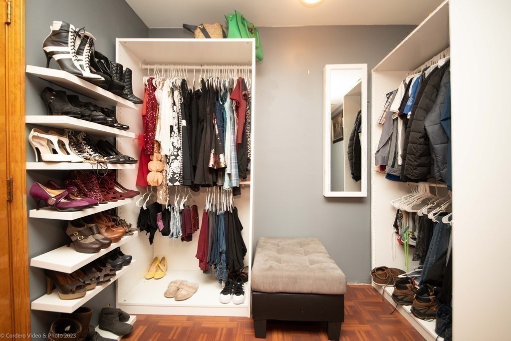 478 Third Street Fall River, MA 02721 - Photo 28 of 35 a view of walk in closet with clothes and shoes