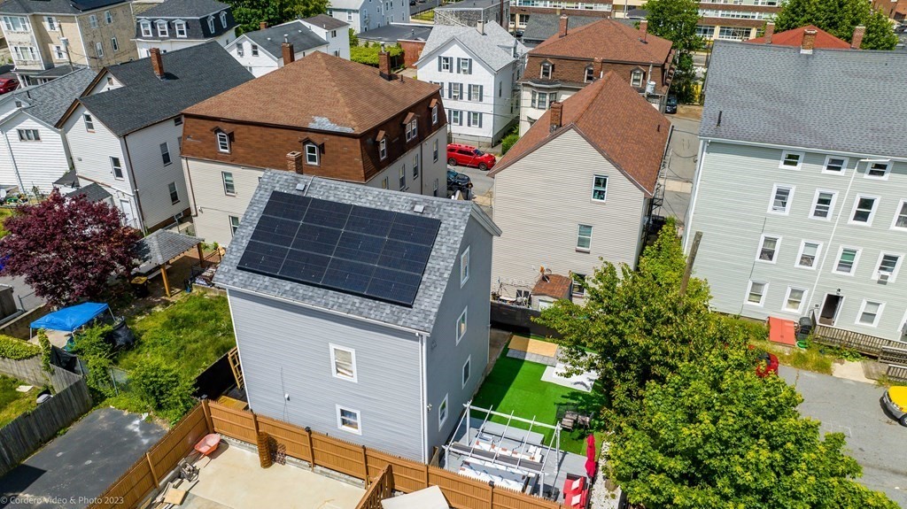 478 Third Street Fall River, MA 02721 - Photo 3 of 35 an aerial view of a house with a yard