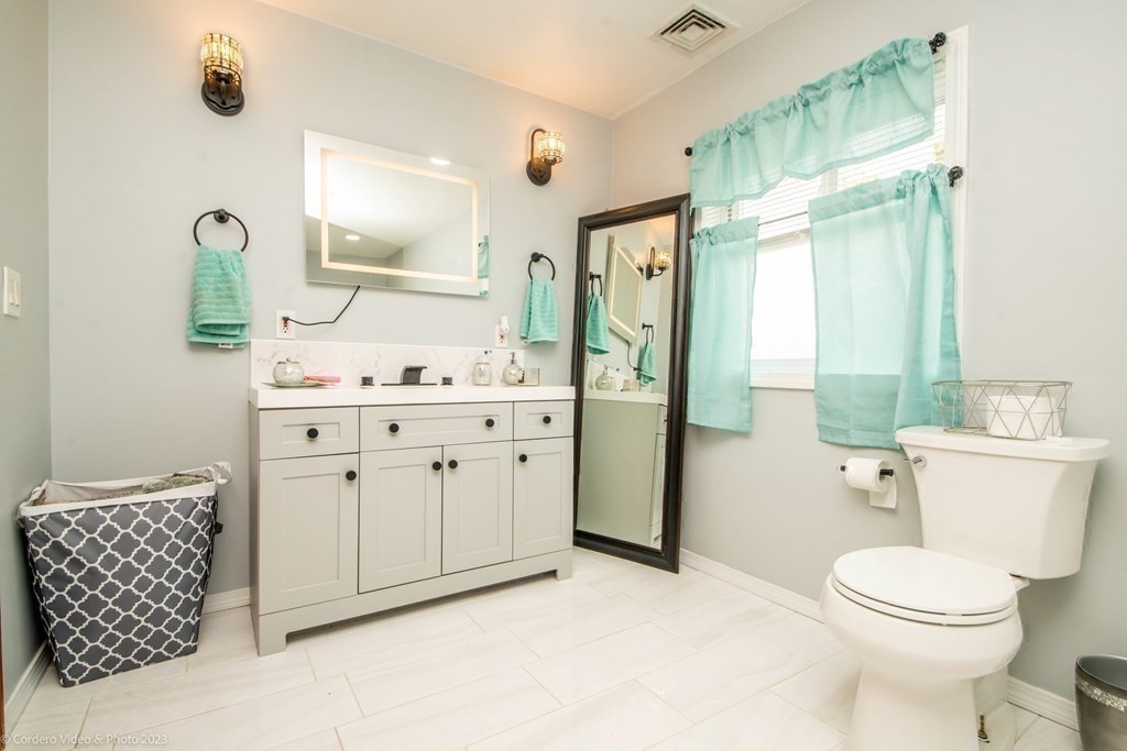 478 Third Street Fall River, MA 02721 - Photo 35 of 35 a bathroom with a sink a toilet and shower