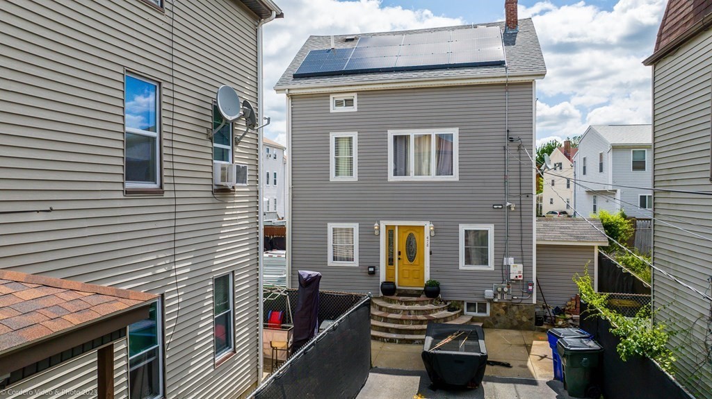 478 Third Street Fall River, MA 02721 - Photo 4 of 35 a front view of a house with outdoor seating
