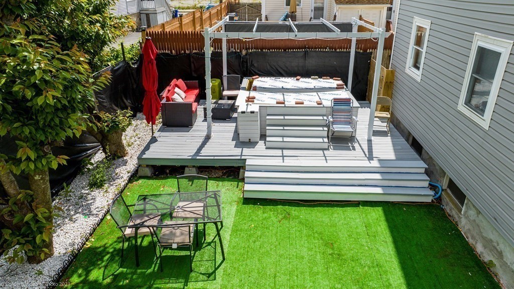 478 Third Street Fall River, MA 02721 - Photo 5 of 35 a view of a chairs and table in patio