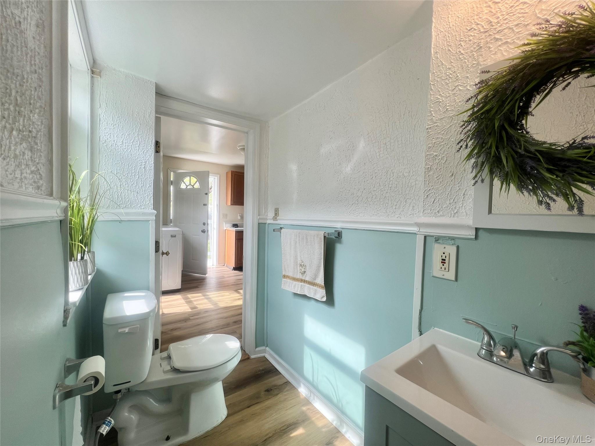 34 Smith Street Poughkeepsie, NY 12601 - Photo 13 of 46 a bathroom with a sink and a mirror