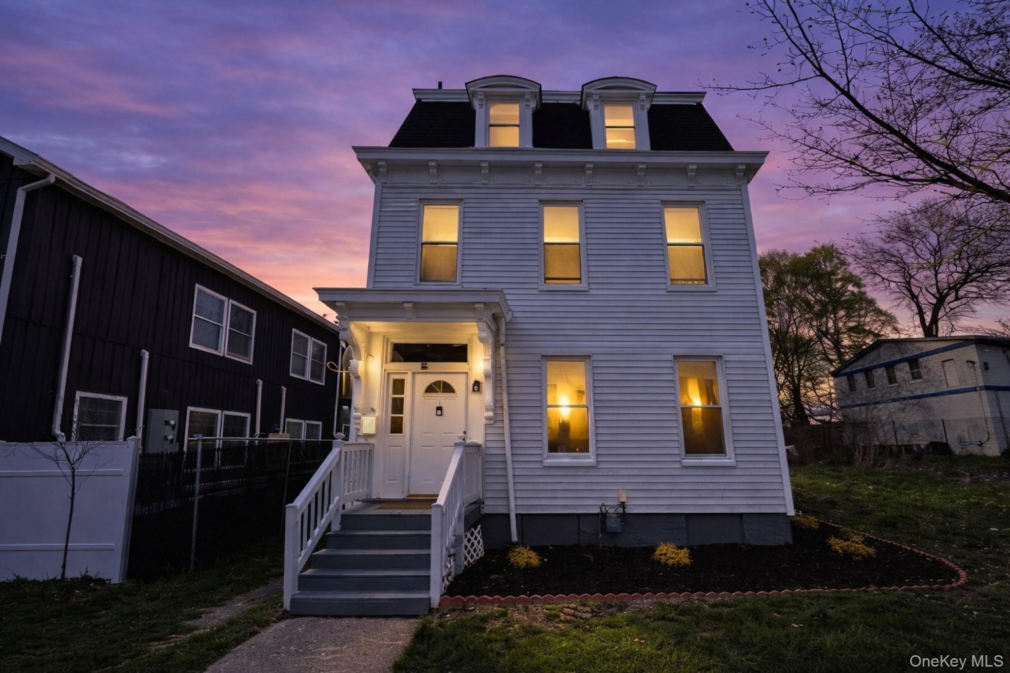 34 Smith Street Poughkeepsie, NY 12601 - Photo 2 of 46 a front view of a house with stairs and a yard